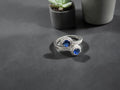 anillo de plata con circonitas azules